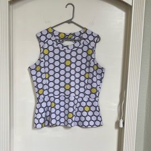 Black white and yellow patterned peplum sleeveless blouse